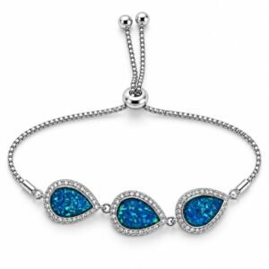 Three teardrop blue opals with crystal halo · 306E